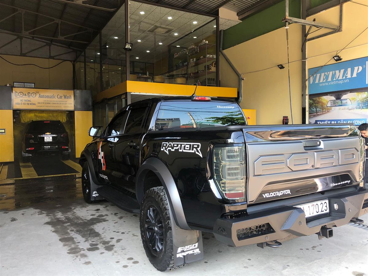 Pickup truck inside a GO&GO automatic car wash machine